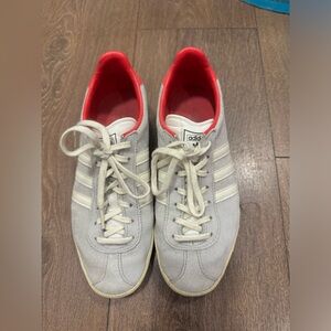 Classic Adidas shoes with stripes